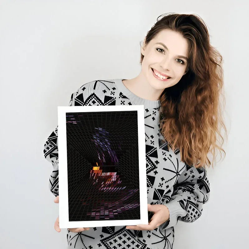 Woman holding a framed picture against a white background