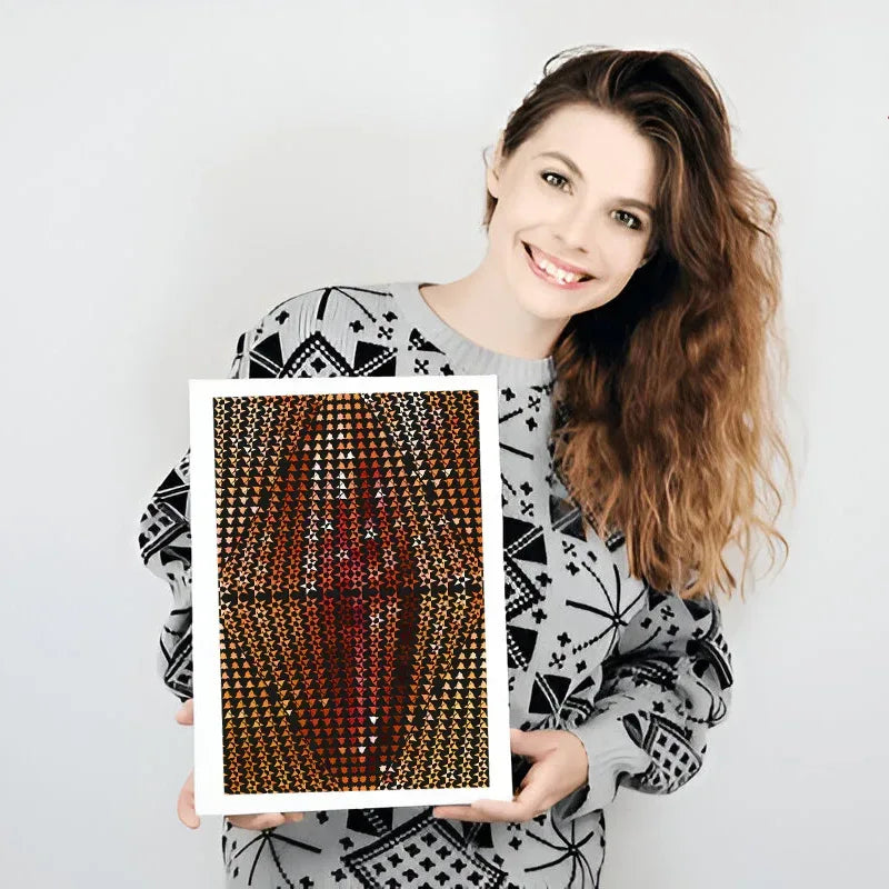 Woman holding a pattern swatch against a white background