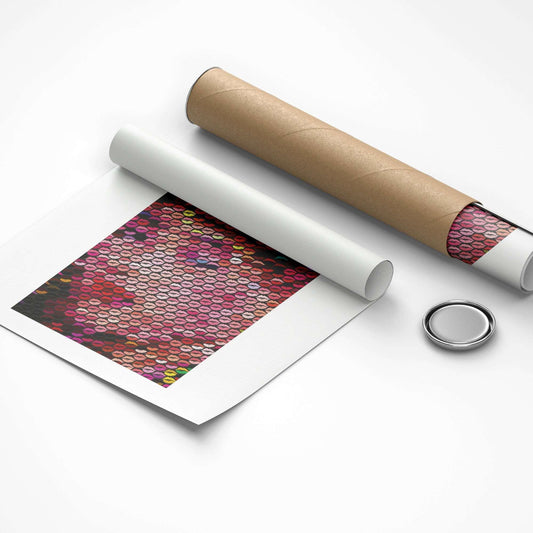 Roll of paper with a patterned finish, cardboard tube, and metal button on a white background