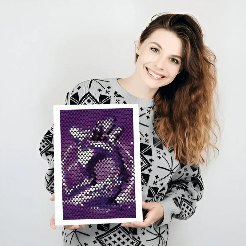 Woman holding a framed purple abstract art piece against a white background