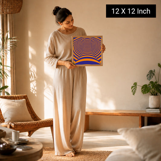 A woman in a light beige outfit holds a colorful 12x12 inch Serenity Meditation Art print in a cozy room with plants.