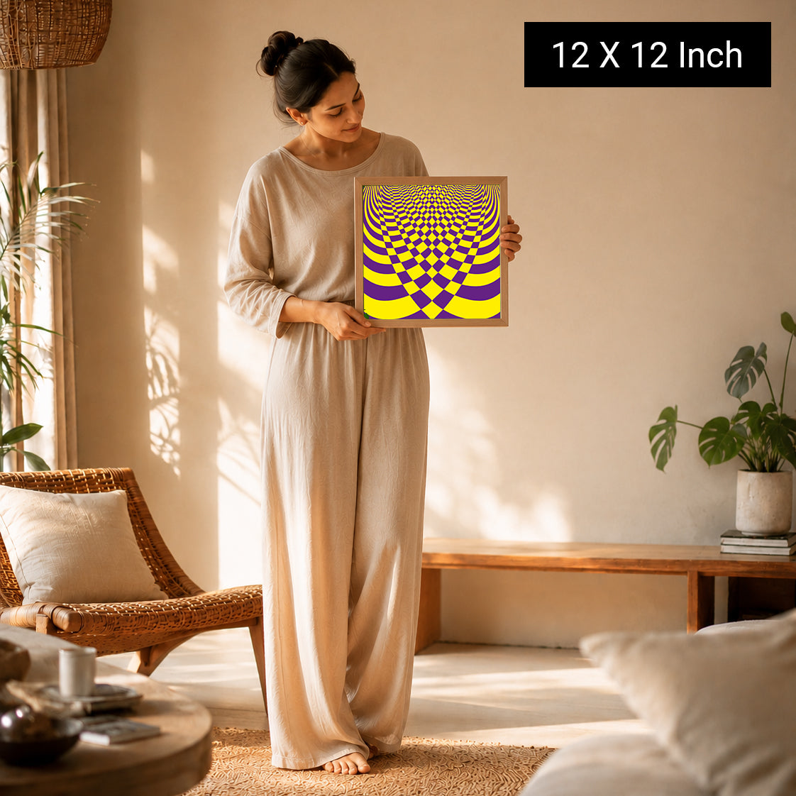 A woman in a beige outfit holds a 12x12 inch Serenity Art print featuring a colorful, swirling design, ideal for yoga and the