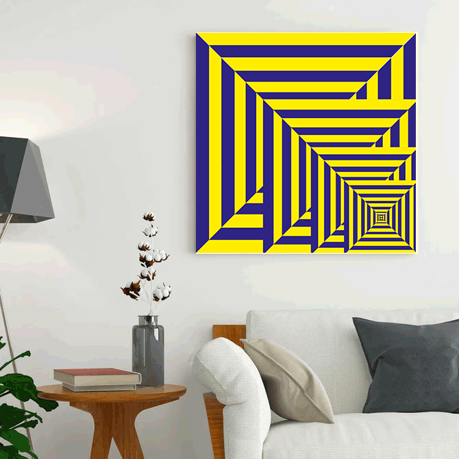 Geometric abstract art piece on a wall in a living room setting.