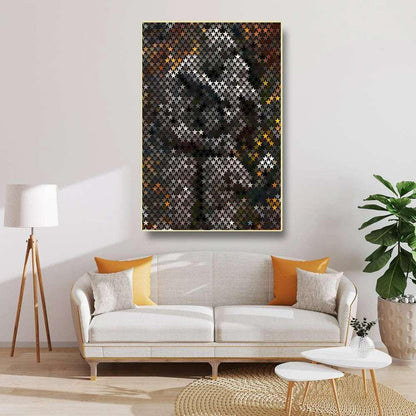 Living room with a modern sofa, abstract art on the wall, and decorative elements.