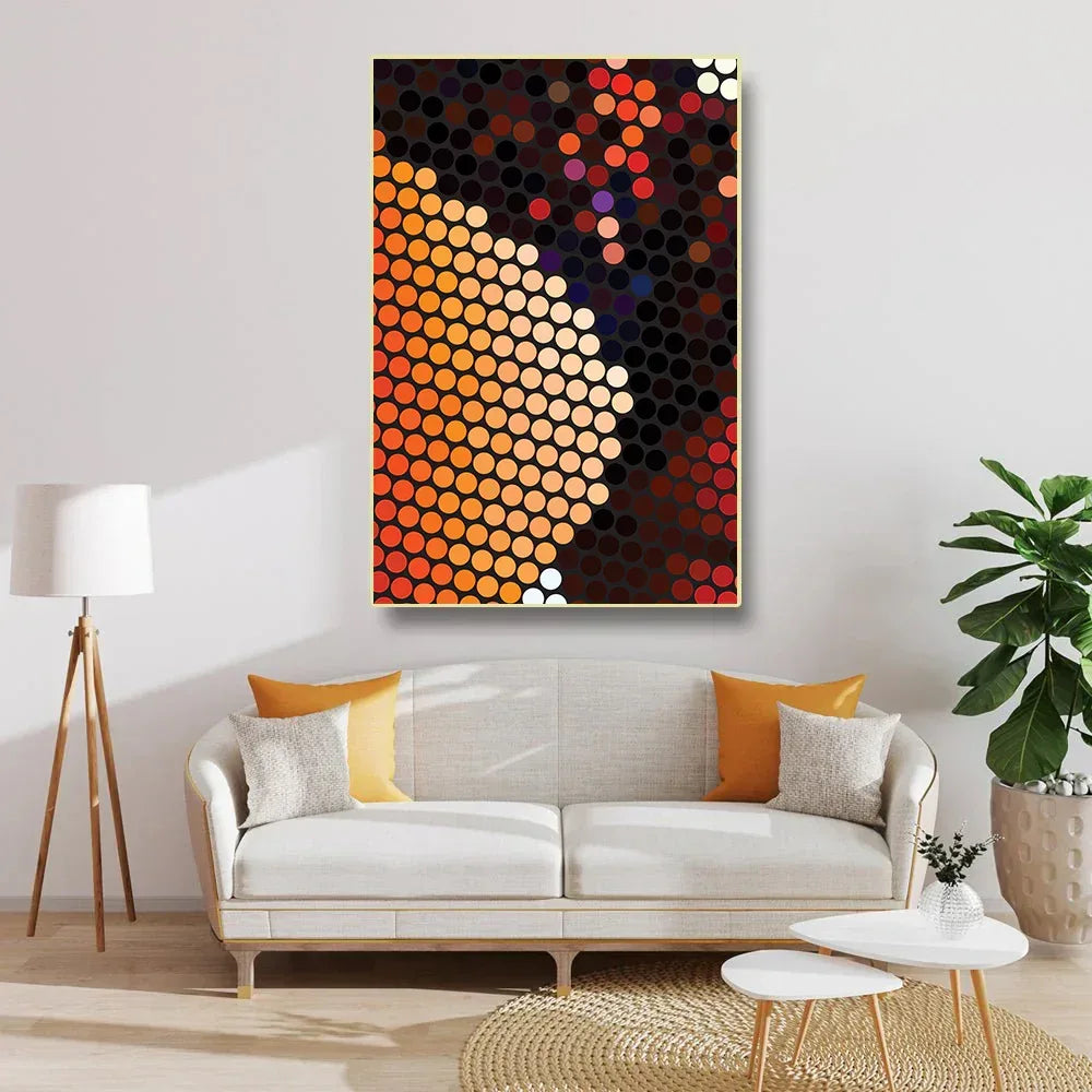 Living room with a modern sofa, abstract art on the wall, and decorative elements.