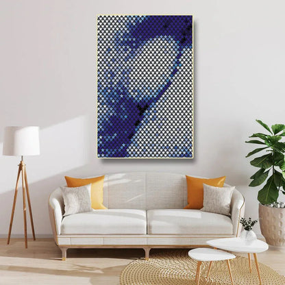 Living room with a white sofa, colorful cushions, and a large abstract painting on the wall.