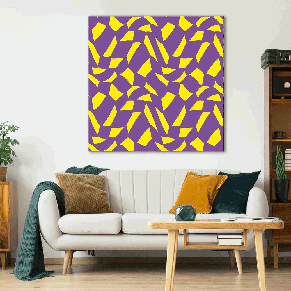 Living room with a white sofa, colorful cushions, and a large abstract painting on the wall.