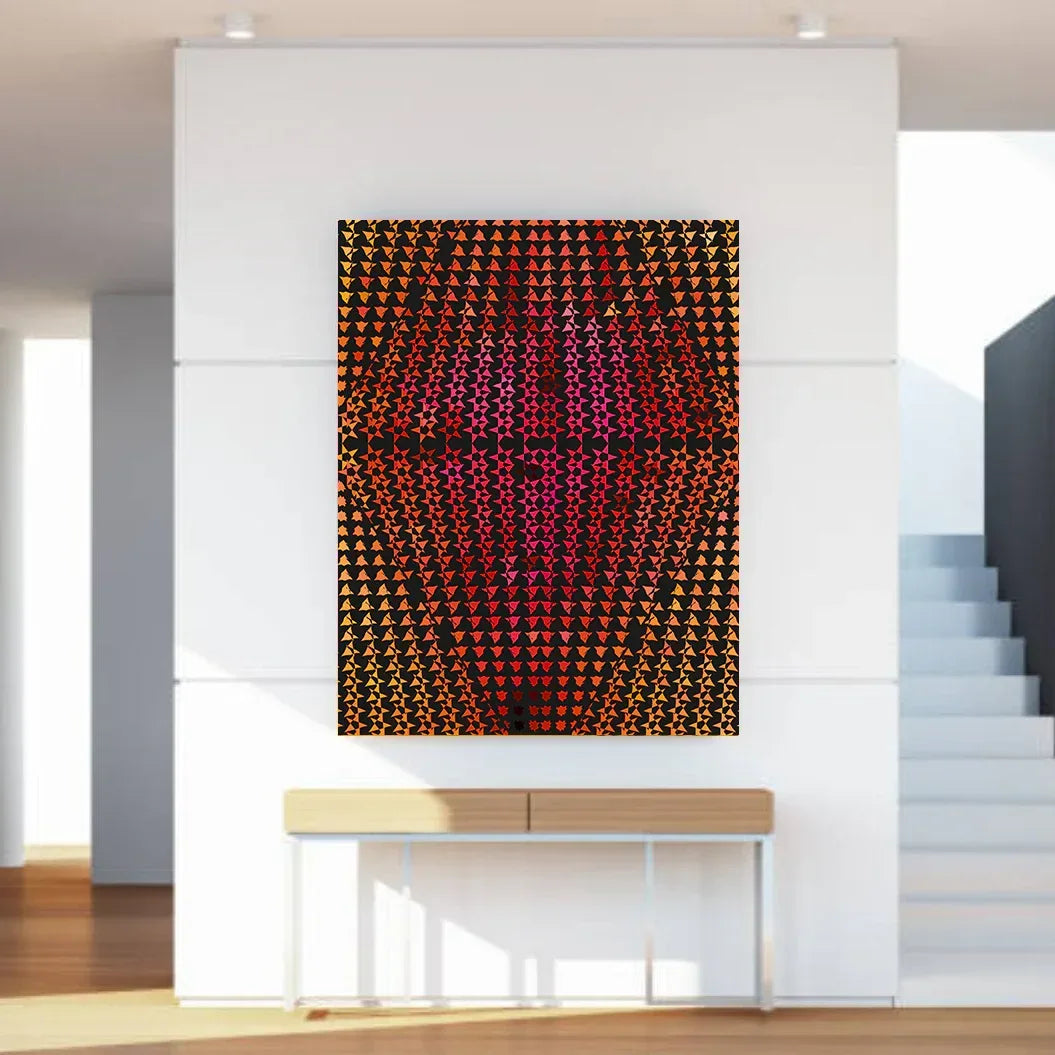 Abstract art piece with a gradient of colors on a white wall above a console table.