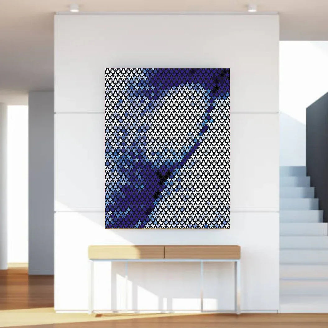 Abstract art piece on a wall in a modern interior setting