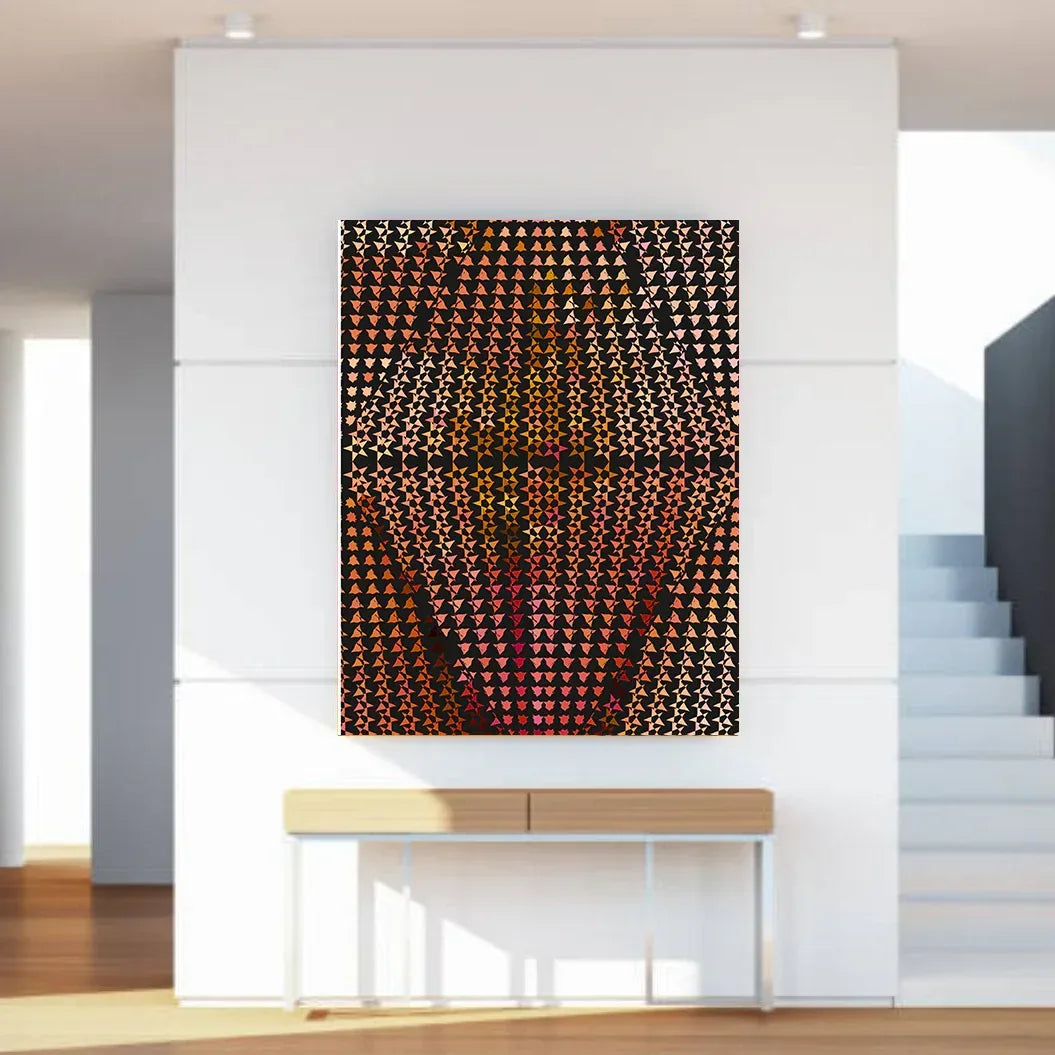 Abstract art piece with geometric pattern on a white wall in a modern interior setting.