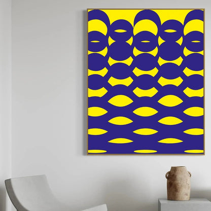 Abstract art piece with blue and yellow pattern on a white wall