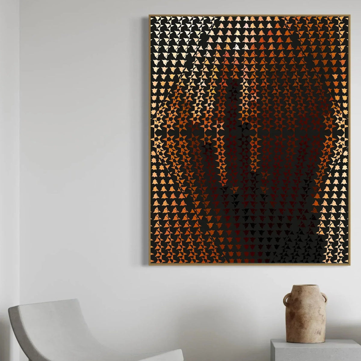 Decorative wall art with geometric pattern on a plain wall.