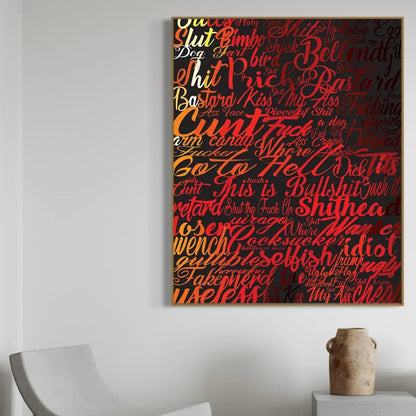 Canvas print with profanity on a wall above a chair and vase.