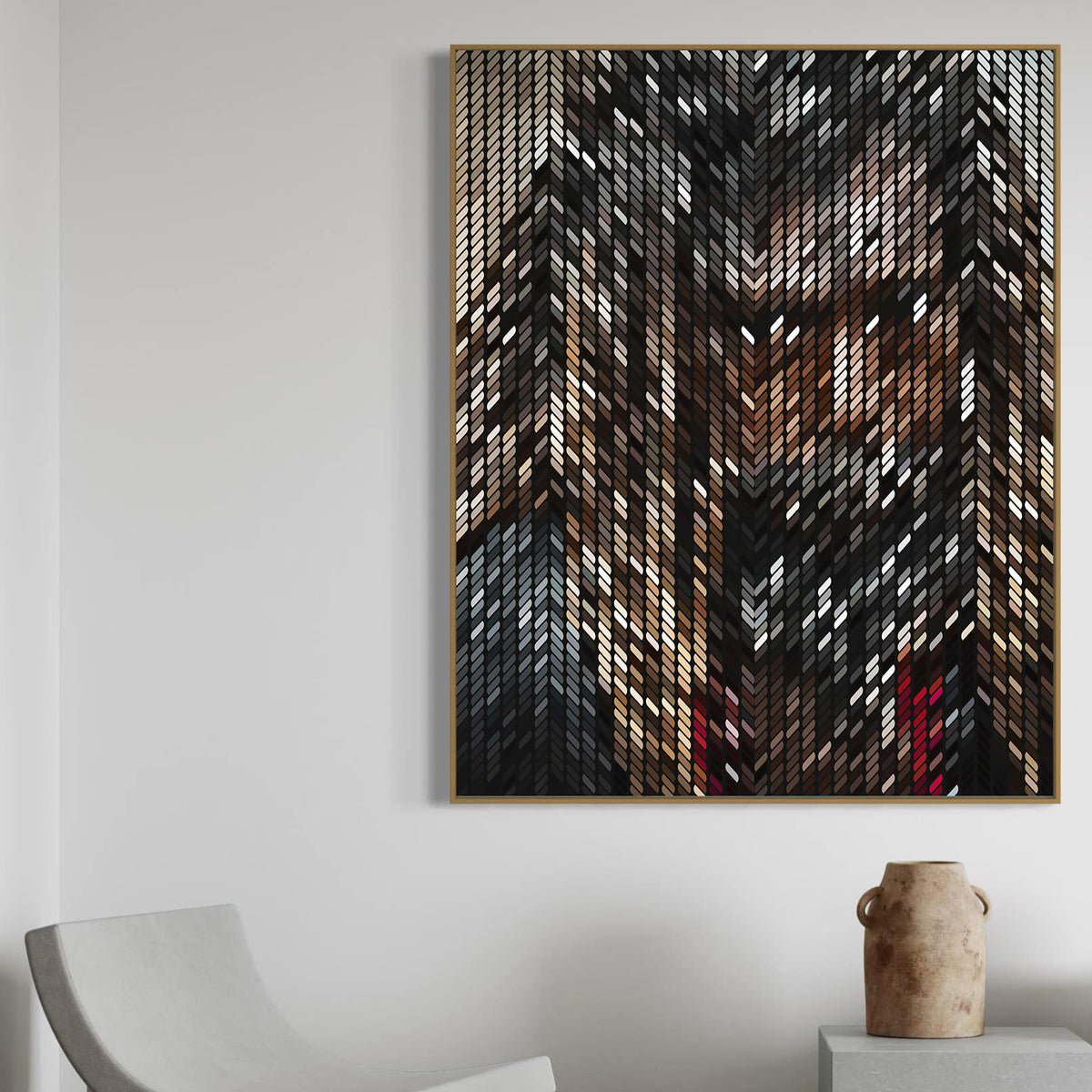 Abstract art piece with geometric pattern on a white wall, featuring a chair and vase in the foreground.