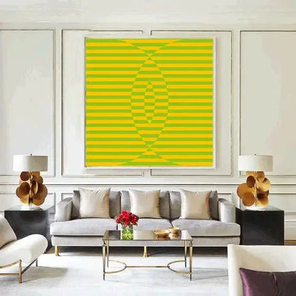 Modern living room with a gray sofa, coffee table, and decorative items.