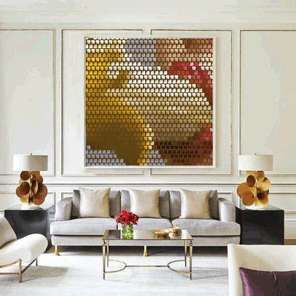 Modern living room with a large abstract painting, gray sofa, and decorative items.