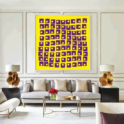 Living room with a gray sofa, coffee table, and abstract art on the wall.