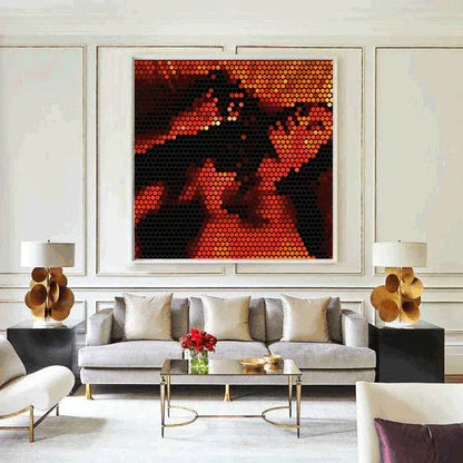 Modern living room with a large abstract artwork on the wall, gray sofa, and decorative elements.