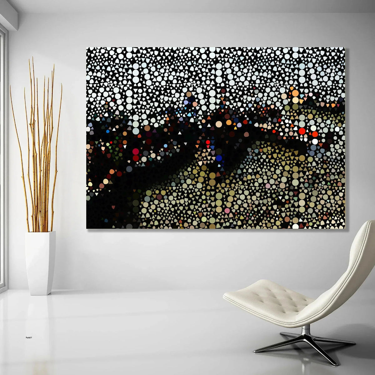 Abstract art piece with colorful dots on a white wall above a modern chair.