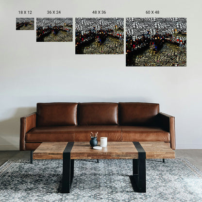 Reception desk area in a counseling center with a serene abstract print behind staff.