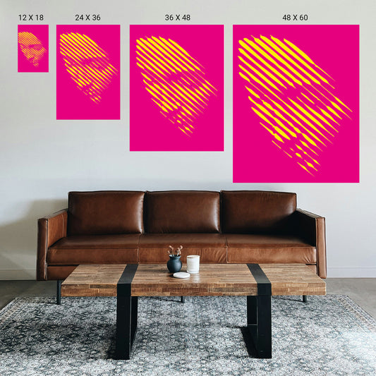 Massage or spa treatment room with warm‑toned dot‑art print above the table.