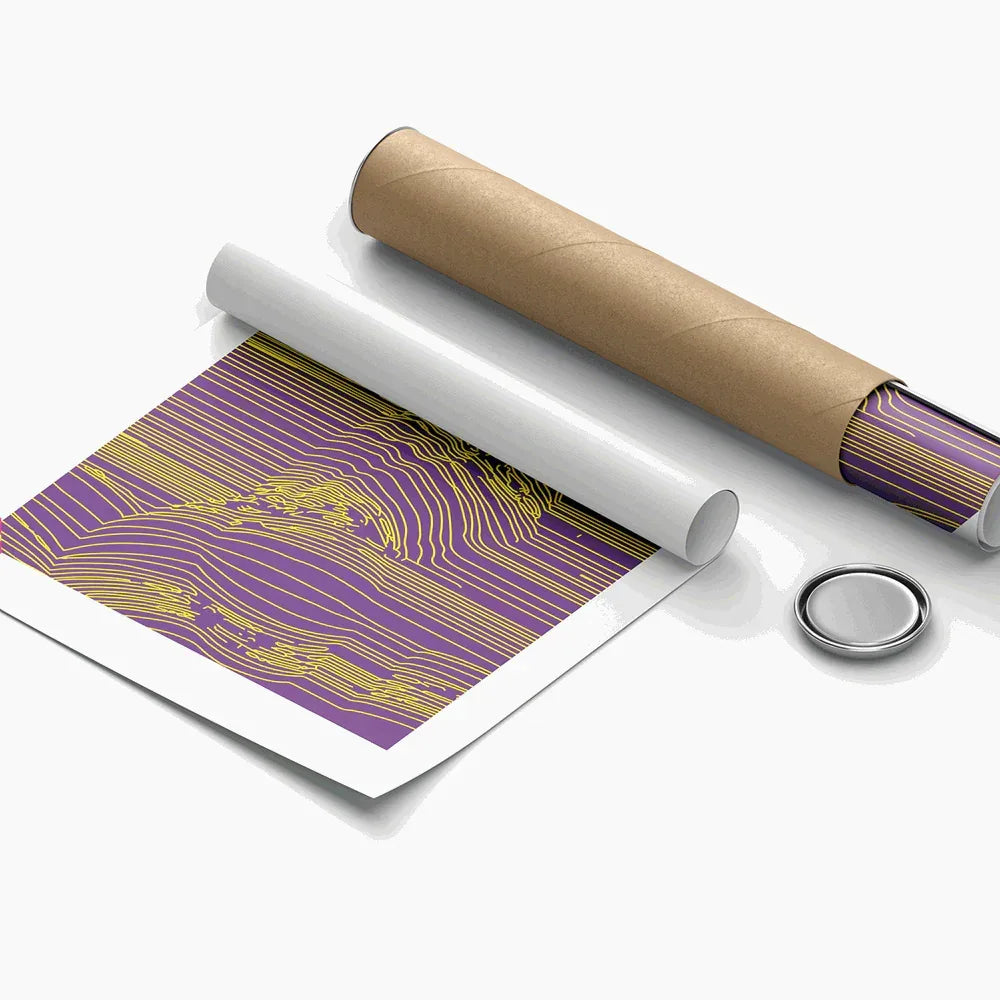 Roll of paper with purple and gold design next to a cardboard tube and a metallic object on a white background
