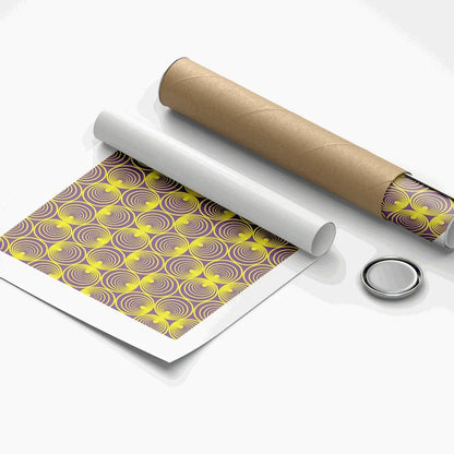 Roll of patterned paper with a roll of brown paper and a metal button on a white background