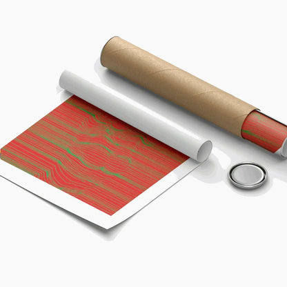 Roll of red and green patterned paper with a white roller on a white background