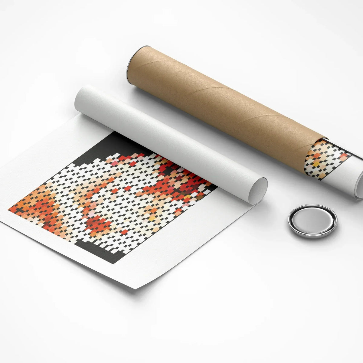 Unrolled paper with a pattern, cardboard tube, and metal button on a white background