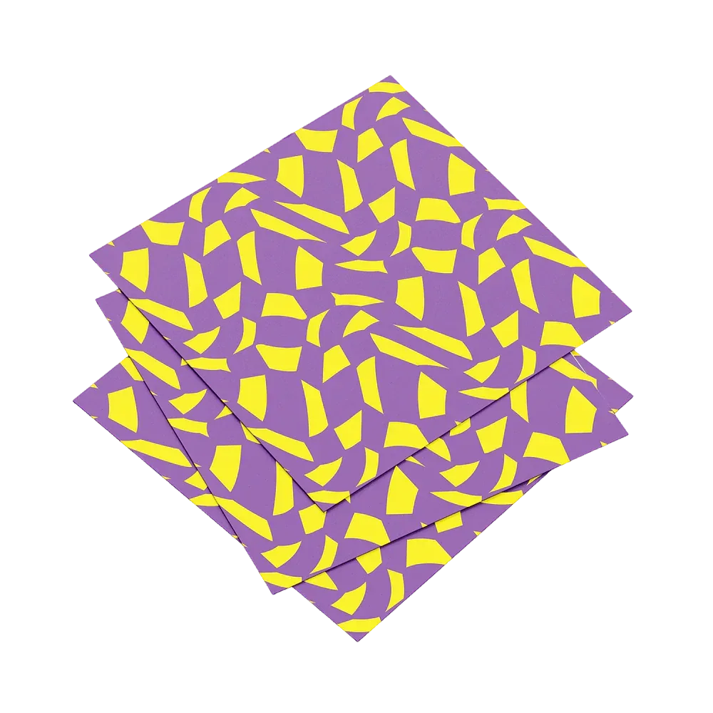 Three purple napkins with yellow geometric pattern on a white background