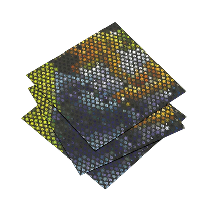 Four patterned paper sheets stacked on a white background