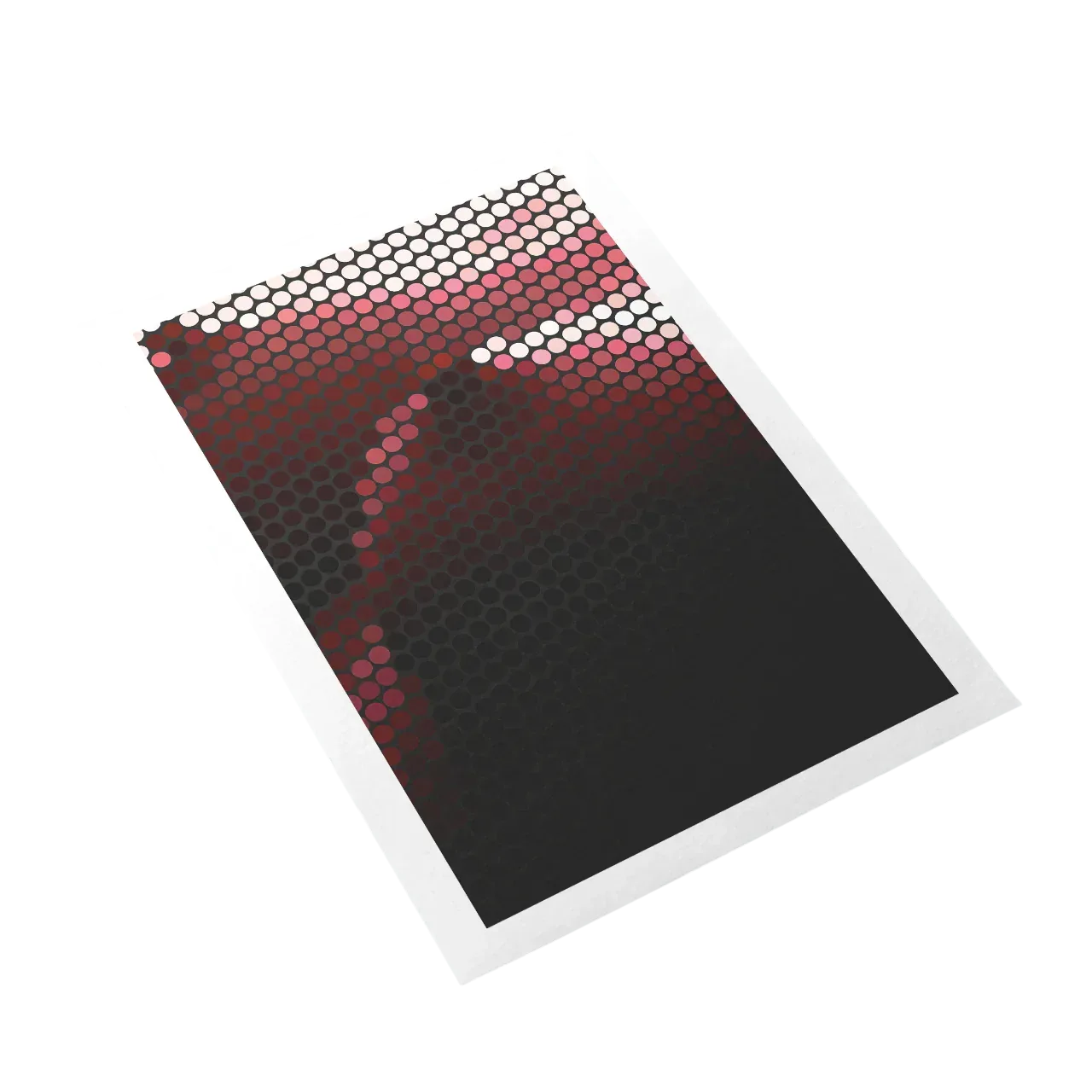 Notebook with a red to black gradient cover on a white background