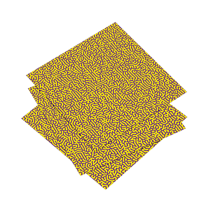 Two yellow placemats with a geometric pattern on a white background