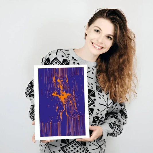 Woman holding a framed abstract artwork with blue and orange colors on a white background