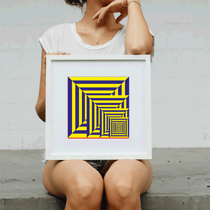 Person holding a framed yellow and blue geometric art print against a plain background