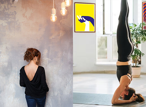 Soft‑lit therapy room with a warm bilateral art piece behind an armchair